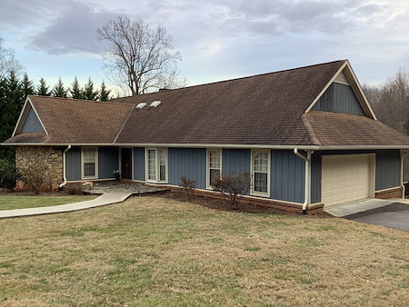Roof soft washing vs roof pressure washing whats safe for asphalt shingles